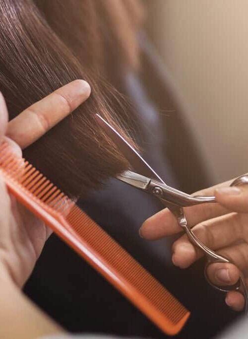 From Traditional Uniforms to Modern Scrubs: The Evolution of Hairdressing Attire